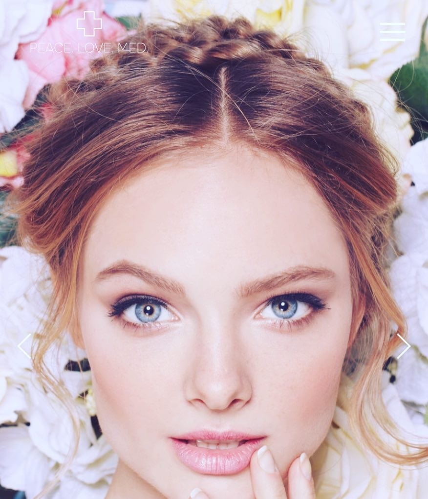 A closer photo of a blond woman A closer photo of a blond woman with blue eyes